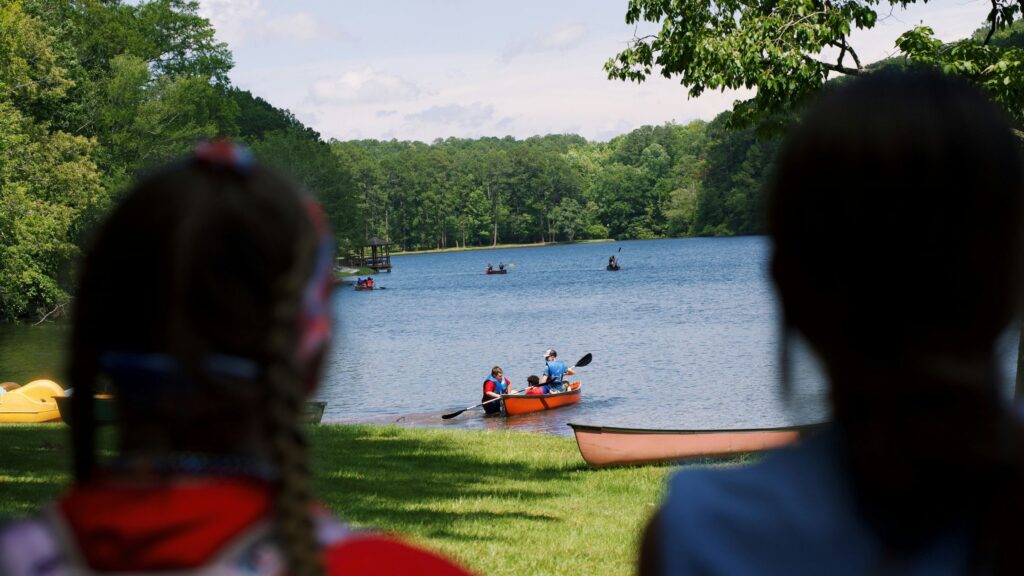 Summer Camp Marketing: How To Increase Enrollment & Fill Your Camp Faster 2 kids participating in outdoor summer camp program